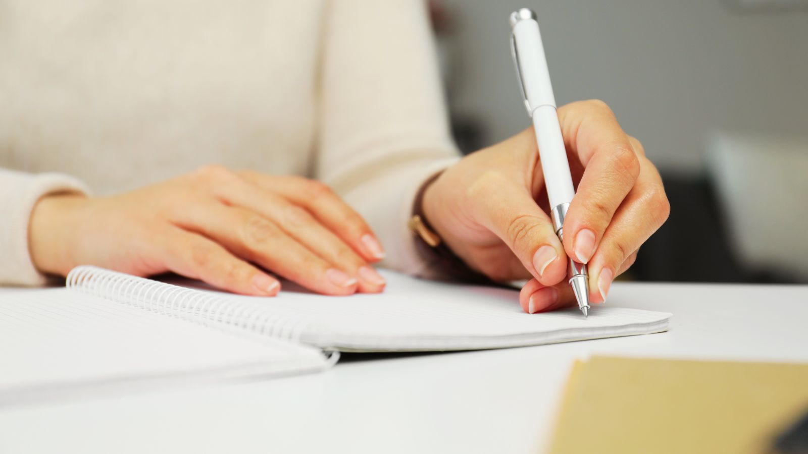 Left Handers Day celebration with a happy left-handed person writing
